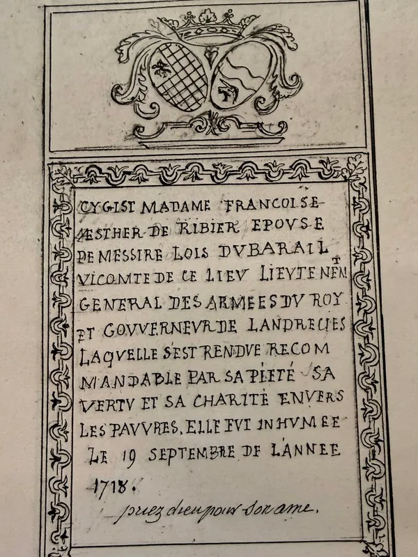 Second carved coat of arms on a funerary slab